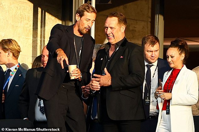 Peter Crouch was seen deep in conversation with another former England international, David Seaman.