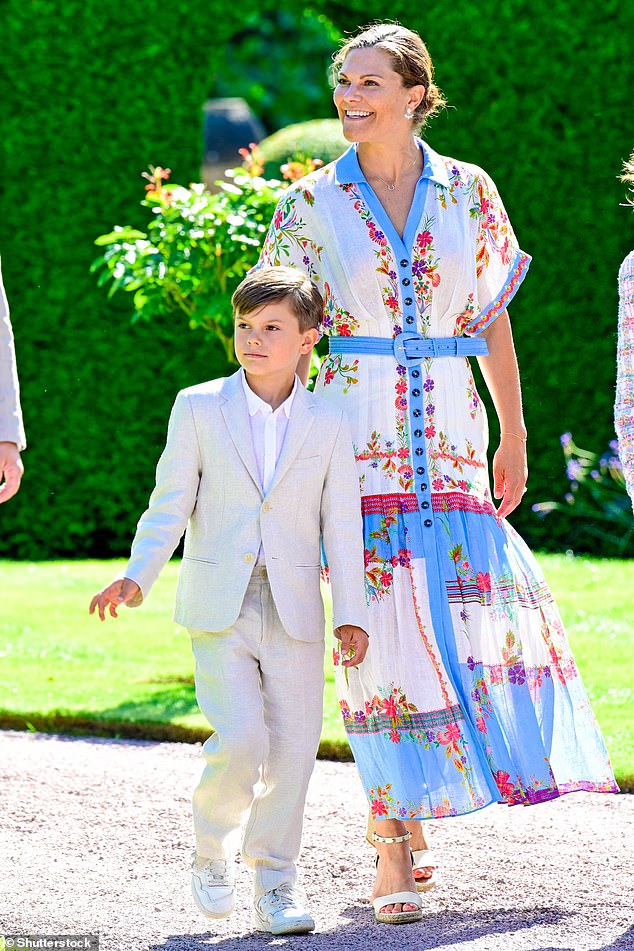 The couple's youngest son, eight-year-old Prince Oscar, wore a white suit - but kept his comfy trainers on!