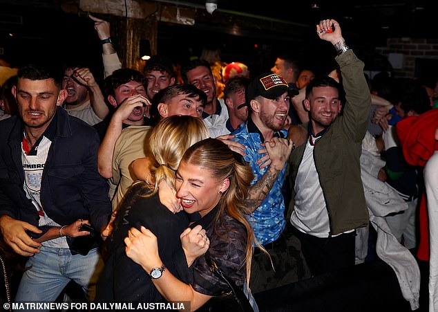 Hundreds of expats braved the cold early Monday morning to cheer on England, but their hopes were dashed minutes after this photo was taken.