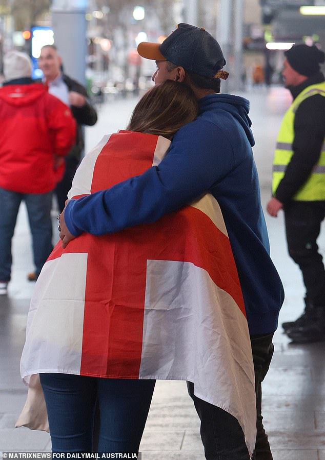 England fans consoled each other as they realised another trophy would not be coming home.