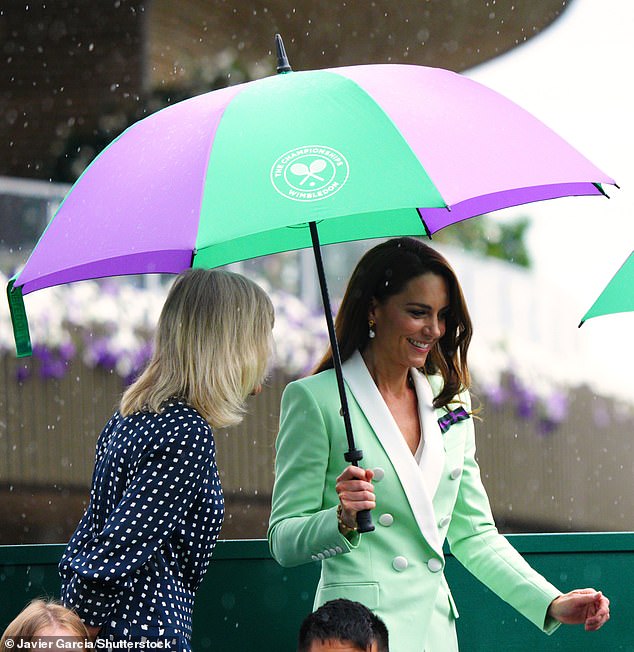 Last year, Kate Middleton was photographed sporting the bun alongside an umbrella as she watched a match in the rain.