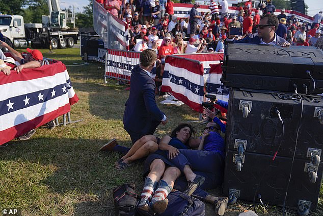 Trump spoke to journalist Salena Zito, who was photographed at the rally after the shooting, hiding behind a speaker.