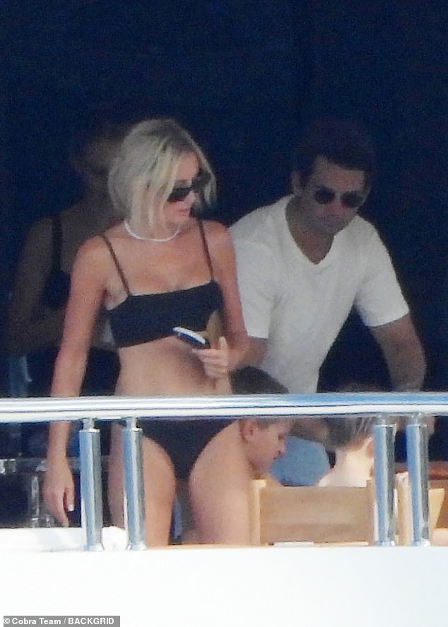 Roxy showed off her toned body and tanned skin in a sleek black bikini as she enjoyed the summer weather.