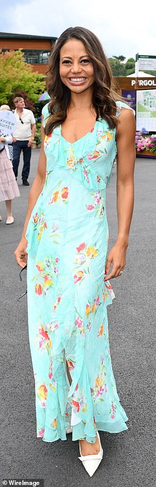 Emma chose a flowing turquoise Ralph Lauren dress for the event.