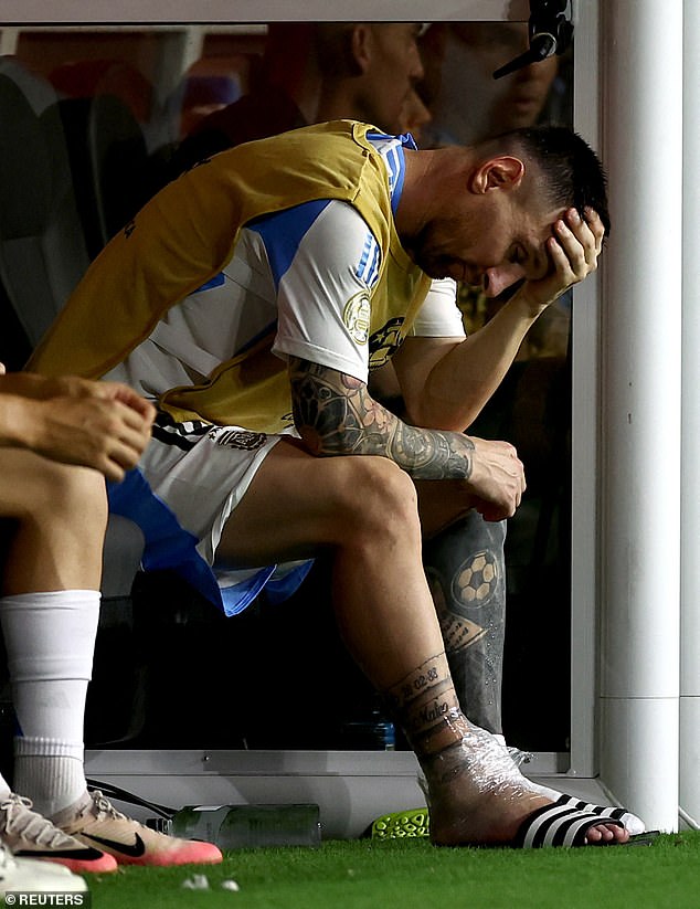 Argentine Lionel Messi looked dejected after being substituted due to injury