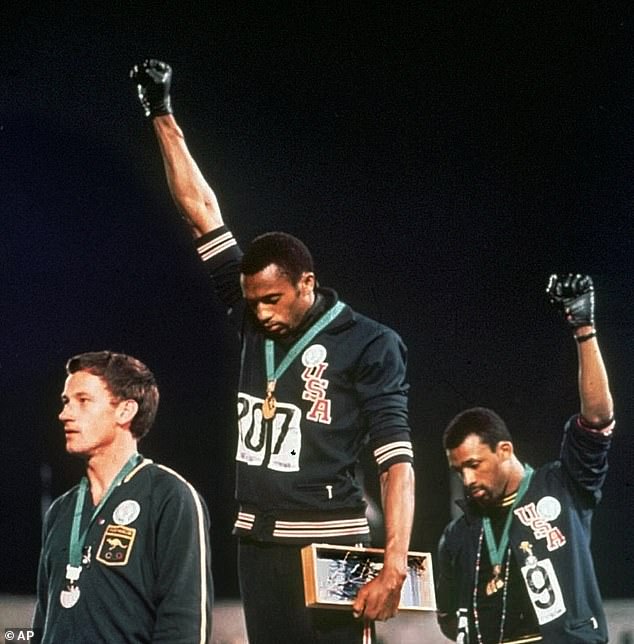 The author expressed fears that the former president's raised fist gesture would attract black voters by associating it with the Black Power protest of American athletes Tommie Smith and John Carlos.