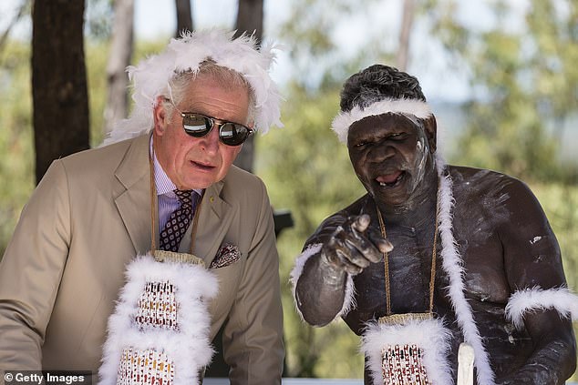 King Charles talks to an indigenous elder during a traditional welcome ceremony to the country on April 9, 2018