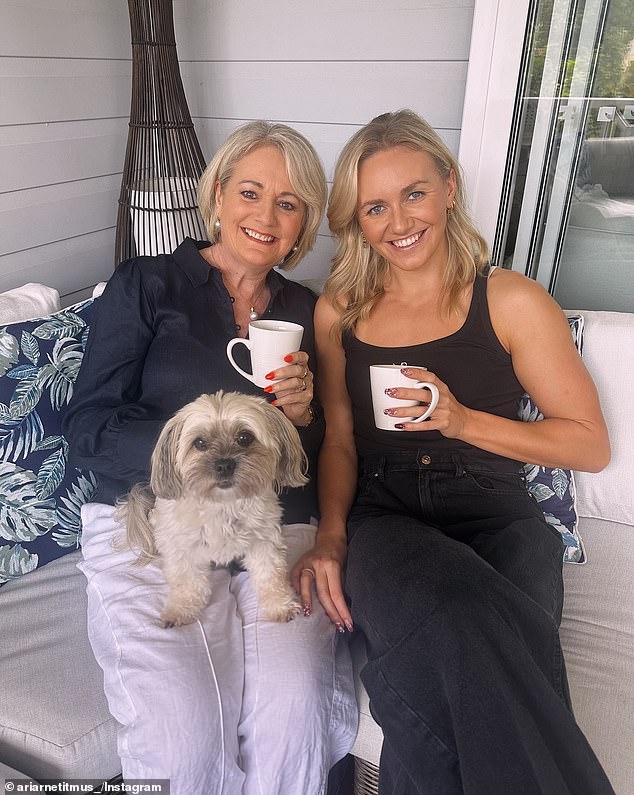 Ariarne (pictured with her mother Robyn) has always been a water baby since her troubled arrival into the world.