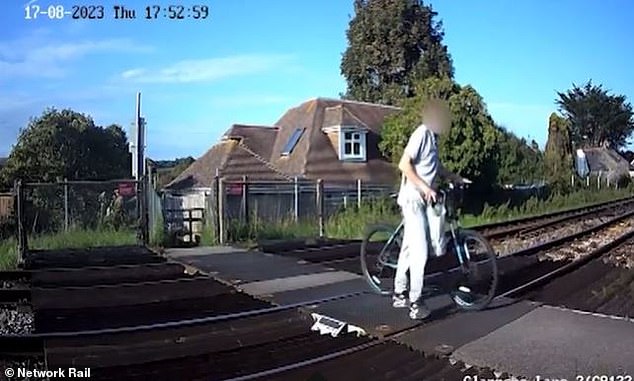 Network Rail has released the images to remind parents and children to remain vigilant around railway lines as incidents of level crossing misuse increase during the summer holidays.