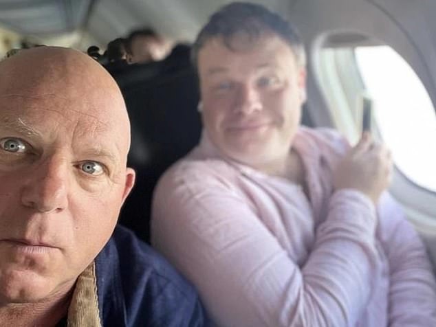 Mark Llewellyn is pictured, left, with Taylor Auerbach, right, on a plane to see Lehrmann and convince him to give him an exclusive interview.