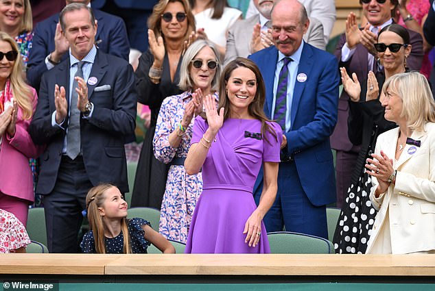 Meanwhile, Princess Kate, who was accompanied by her sister Pippa and her daughter Princess Charlotte (left), opted for a stunning $2,500 royal purple gown by Safiyaa.