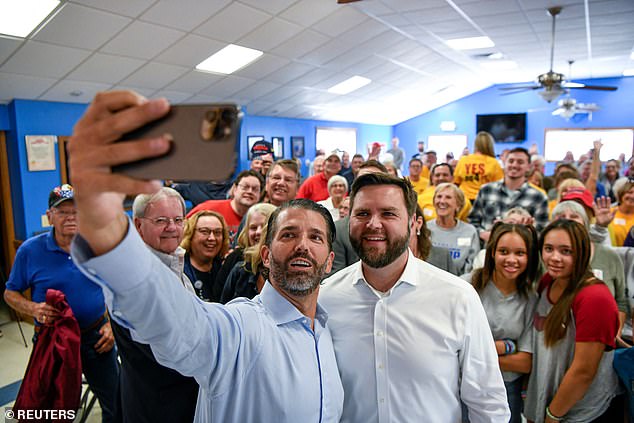 Vance has become close to Donald Trump Jr., who is seen here campaigning with him in 2022.