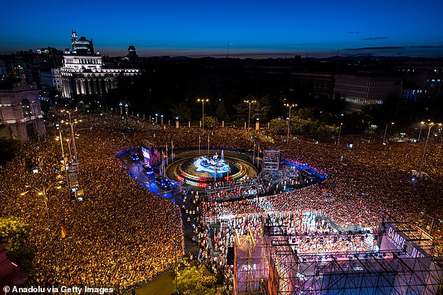 Thousands of fans packed the central Plaza de Cibeles in the center of Madrid