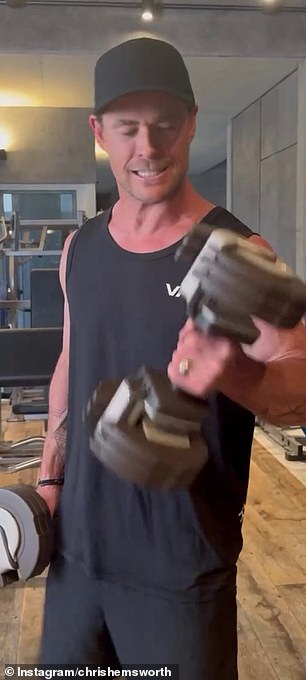 1721105002 210 Chris Hemsworth shows off his impressive biceps as he hits