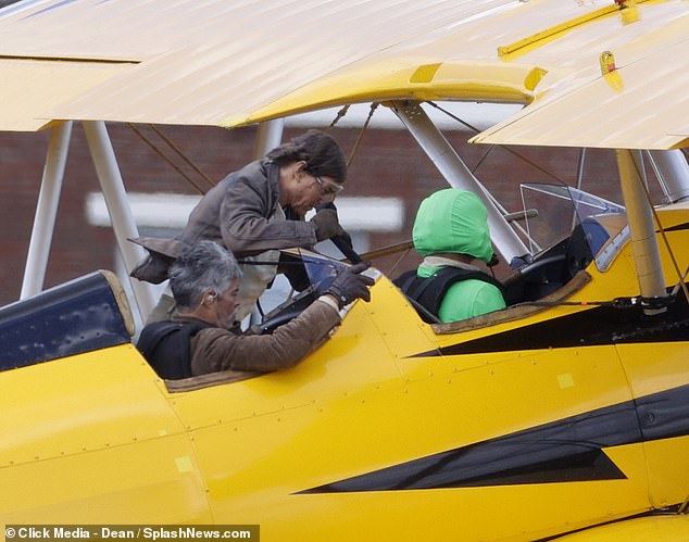 The 62-year-old actor, who will return to screens as Constable Ethan Hunt next year, clung to the underside of a yellow Stearman biplane as it flew over Oxfordshire.