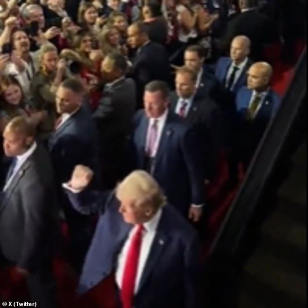 Video footage showed the 1.90-metre tall president surrounded by equally burly security guards.