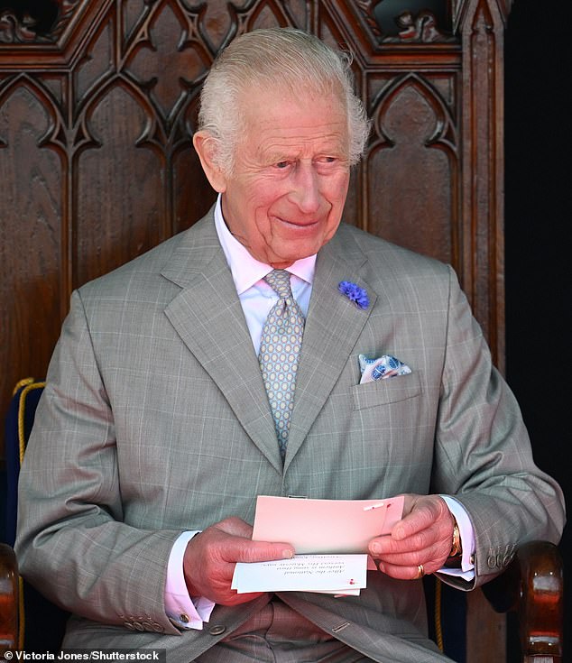 The King appeared relaxed as he sat in a parliamentary chair for the States of Deliberation session.