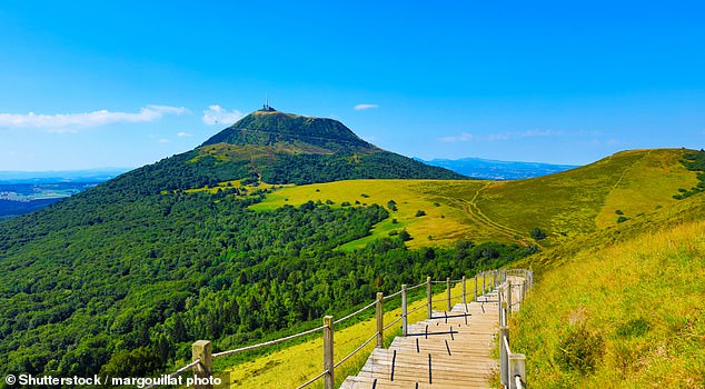 The Chaîne des Puys mountain range encompasses more than 80 volcanoes, with the Puy de Dôme (pictured) being the highest point at 1,465 m (4,806 ft)