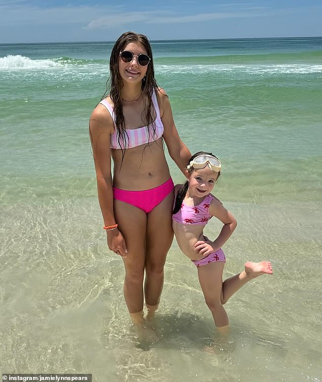 Jamie was joined on the beach by her daughters Maddie, 15, and Ivey, six (pictured), as well as her mother Lynne, 69.