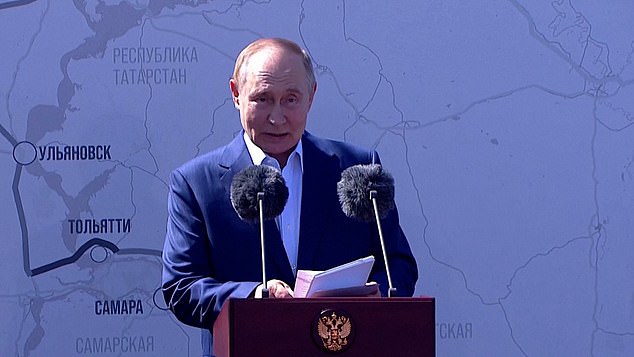 Putin addresses road construction workers after opening of new section of M-11 highway in Russia