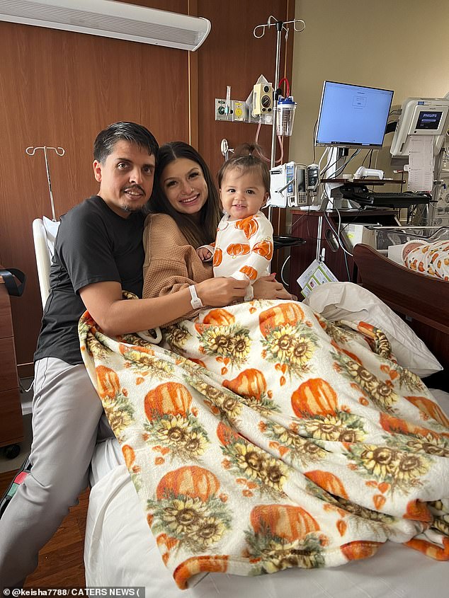 Keisha and Teo are photographed in the hospital with Ayla when baby Teo was born.