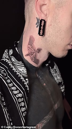 The Hotel Diablo pop-punk rocker also got the Norse god Odin's ravens tattooed on both sides of his neck last Friday by tattoo artist Codey Doran.