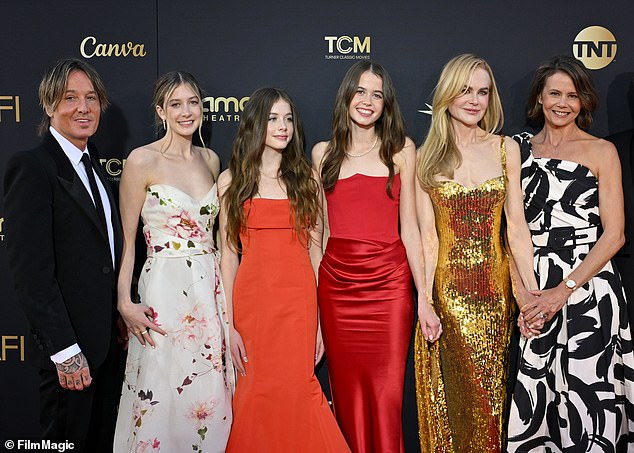 Nicole is pictured with Sunday (second from left), her husband Keith Urban, their youngest daughter Faith, 13 (third from left), her sister Antonia and her daughter Sybella in April.