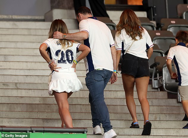 After the loss, Dani was comforted by her actor father Danny, who put his arm around her when she began to cry as they left the stadium.