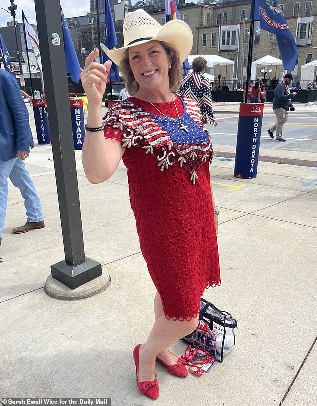 Deana Abiassi with the Texas delegation wearing a sequin collar over a red dress.