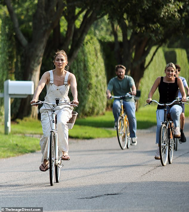 The 54-year-old actress took a bike ride through New York's Hamptons on Tuesday, even as her husband Ben was back in Los Angeles amid rumors of an impending divorce.