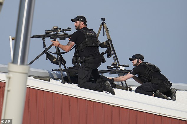 Police snipers return fire after shots were fired as Republican presidential candidate and former President Donald Trump was speaking at a campaign event.