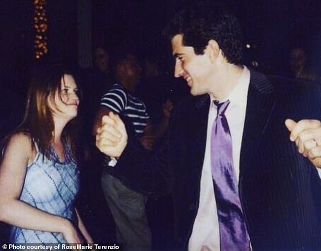 John Kennedy Jr. dancing with author RoseMarie Terenzio to Prince at George's Christmas party in 1999