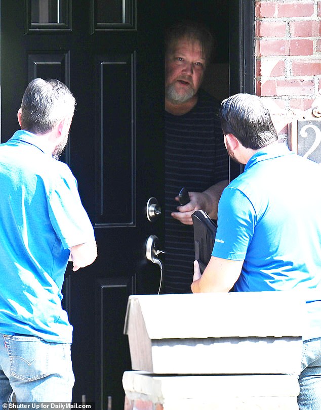 Crooks' father, Matthew, opened the door to several FBI personnel who entered the modest brick home shortly before 10 a.m. Tuesday.