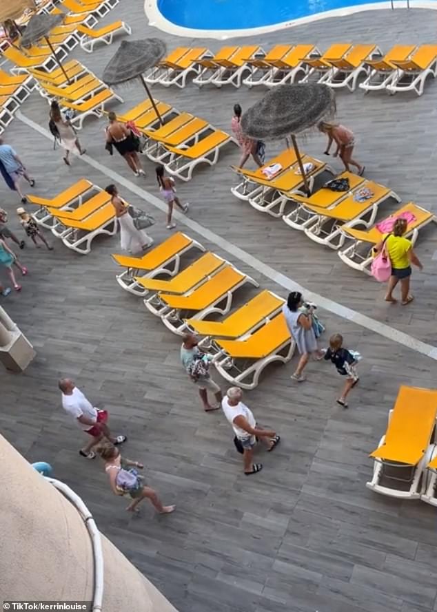 A second video posted on the platform showed tourists taking their places at a hotel on Spain's Costa Dorada on the mainland.