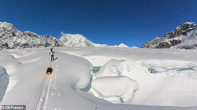 Here the team approaches base camp on the Kahiltna Glacier.