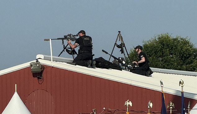 The Secret Service was photographed at Saturday's rally, which was held on a sloped roof near where Trump was giving his speech.