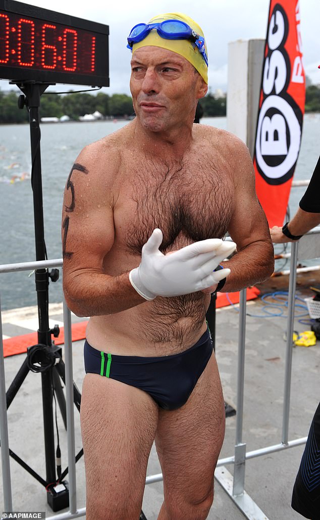 Tony Abbott is a fitness enthusiast who has competed in triathlons. He is pictured after a swimming competition in 2012, two years before he was elected Prime Minister.