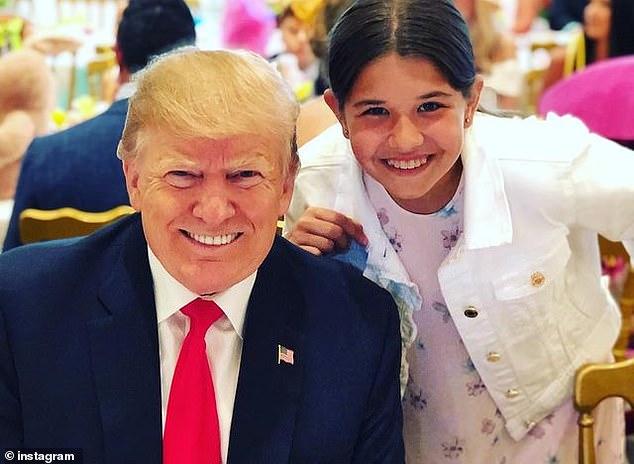 Kai poses for a photo with his grandfather during his time as US President.