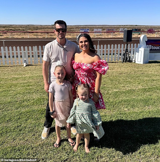 The smiling seven-year-old was photographed with her mother, stepfather and little sister (pictured)