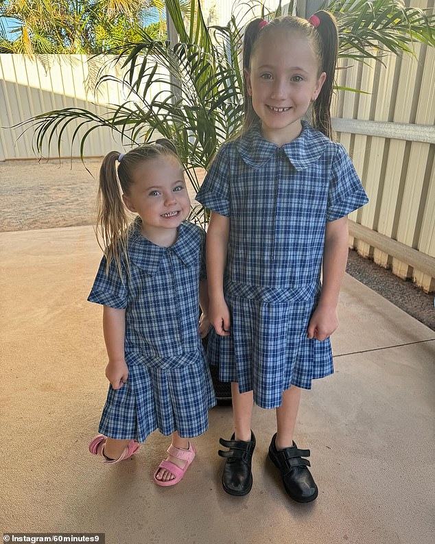 Cleo and her sister Isla photographed before the first day of school.