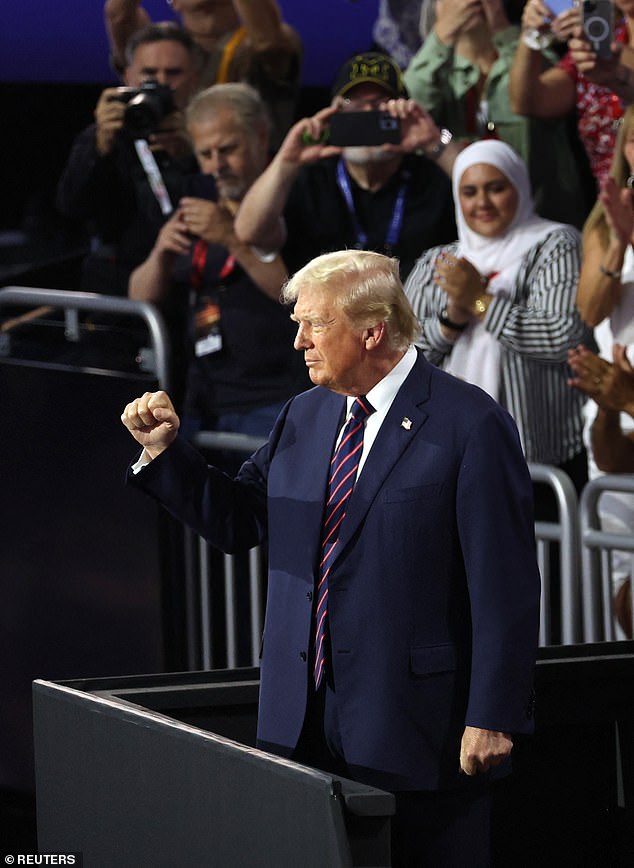 Trump raised his fist toward the crowd, as a series of speakers spoke of his strength and accused Joe Biden of weakness.