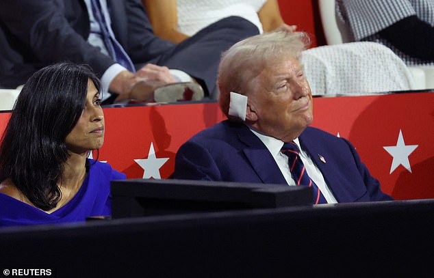 Usha Vance sits next to Donald Trump after speaking at the Republican National Convention as they watch her husband JD accept the vice presidential nomination.