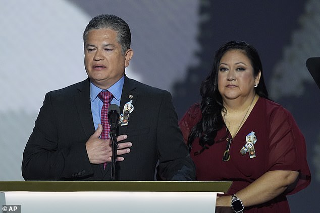 As Herman López read the names of the 13 fallen soldiers, the crowd repeated them.