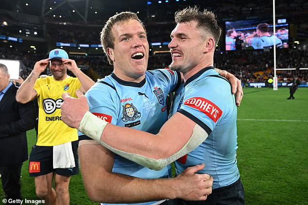 New South Wales captain Jake Trbojevic (left) and NSW Blues' Angus Crichton celebrate victory at Suncorp Stadium