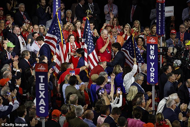 The audience stood and applauded as the brothers carried American flags onto the floor of the Republican National Convention.