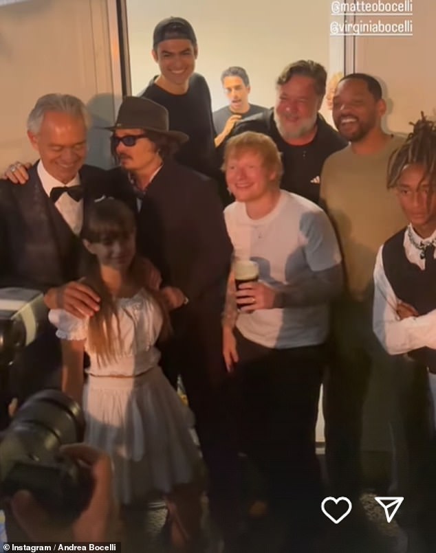 Johnny posed for a group photo with Andrea, his 12-year-old daughter, Virginia Bocelli, Ed, Russel, Will and his 26-year-old son Jaden Smith.