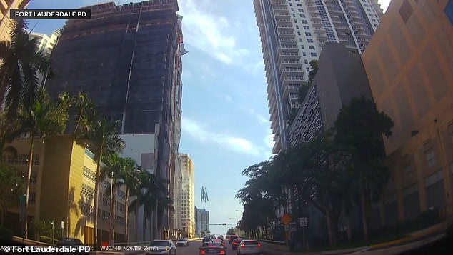 The crane piece was captured by the dashboard camera falling onto the bridge