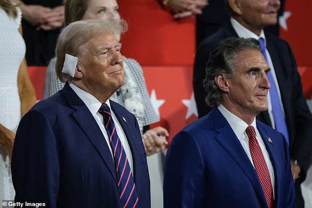 During Kai's remarks, Trump beamed with pride. At one point, he turned to North Dakota Governor Doug Burgum (right) and appeared to say of his granddaughter: 