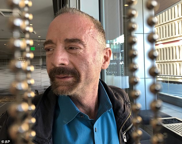 Timothy Ray Brown poses for a photograph on Monday, March 4, 2019, in Seattle. Brown, also known as the 