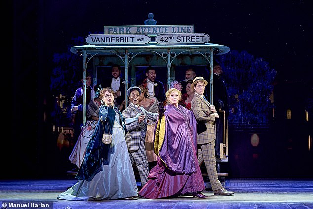 Hello, Dolly! theatre production at the London Palladium. Pictured: Emily Lane, Tyrone Huntley, Jenna Russell and Harry Hepple